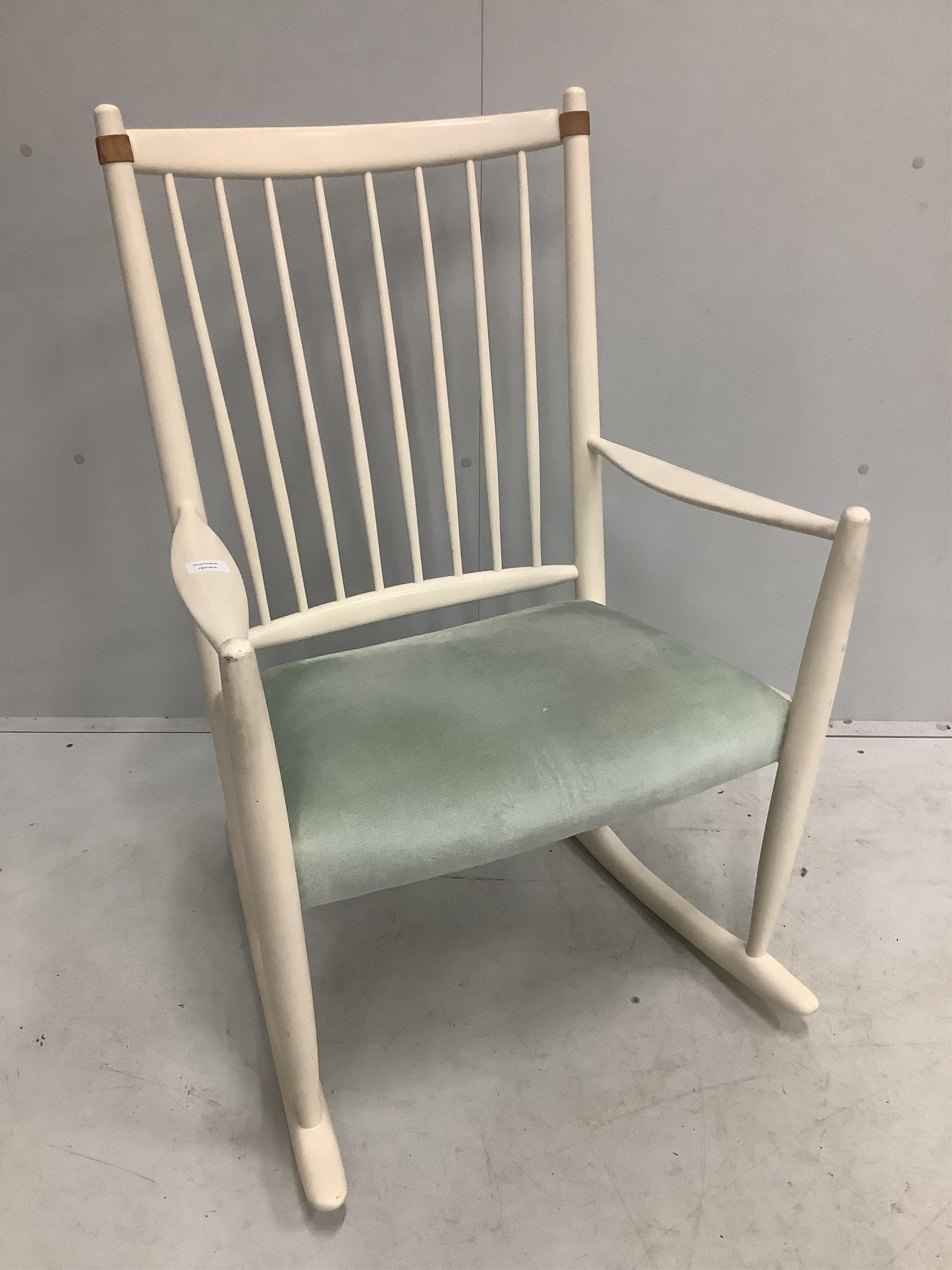 Niels Eilersen. A white painted rocking chair, width 64cm, depth 44cm, height 100cm. Condition - fair